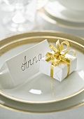 Decorative place setting with a name card at a wedding table