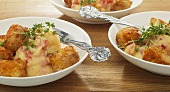 Fish cubes with mashed tomato-potatoes