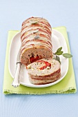 Meat loaf stuffed with peppers and pistachios