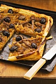 Onion tart with caramelised onions and olives