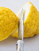 A halved citron lemon