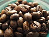 A bowl of coffee beans (close-up)