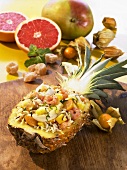 Exoctic rice salad in a hollowed out pineapple half