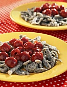 Poppyseed Spätzle (soft egg noodles from Swabia) with hot cherries