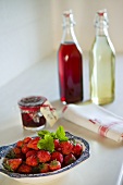 Strawberries, strawberry jam, strawberry juice and elderberry juice