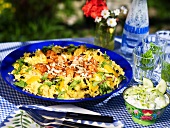 Grilled chicken on rice salad with raisins and oranges