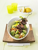 Lamb kebab with Brussels sprouts and apricots