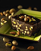 A chocolate terrine with almonds and pistachios
