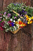 A basket of fresh edible flowers