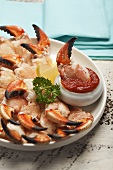 Crab claws with a tomato dip