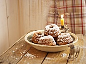 Mini Bundt cakes with icing sugar for Christmas