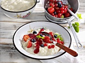 Rice pudding with berries and raspberry sauce