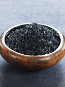 Black Hawaii salt in an earthenware bowl