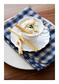 A warm cheese dip with crab meat