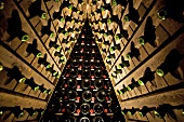 Bottles of Spumante in A-racks (Winery Ferrari, Ravina, Trentino, Italy)