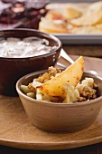 Turnip wedges with a pear and walnut salad and a dip