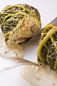 Savoy cabbage roulade filled with chestnuts and ricotta