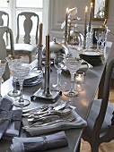 Table with silver and gold utensils
