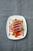 Seared tuna slices on rhubarb compote