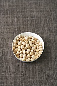 Dried chick-peas in a paper dish