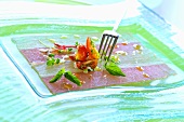 Thunfisch-Schwertfisch-Carpaccio mit Kirschtomatensalsa