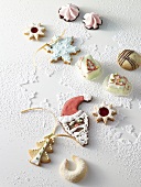 Assorted Christmas biscuits on icing sugar