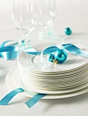 Tableware and glasses with turquoise decorations