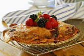 Berry pie in aluminium baking dish