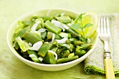 Green bean salad with onions and salad leaves, Chile