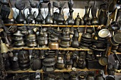 Middle Eastern jugs, pots and pans on a market stall