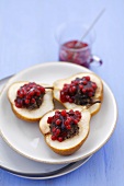 Baked pears stuffed with turkey liver and cranberries