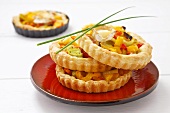 Goat's cheese and vegetable puff pastry tartlets
