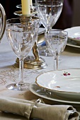 Elegant place-setting with crystal glasses