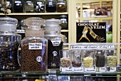 Comfits (candied spices) in jars in a sweet shop