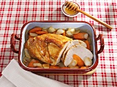 Honey-glazed turkey breast with carrots and onions