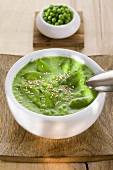 Pea soup with mangetout and sesame seeds