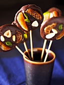 Chocolate lollipops with dried fruit and nuts