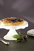 Fig tart on cake stand