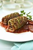 Stuffed savoy cabbage leaves with tomato sauce