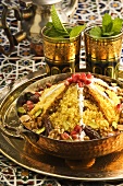 Couscous with pomegranate seeds, dates and pistachios