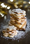 Christmas biscuits with icing sugar, stacked