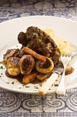Beef braised in red wine with mushrooms