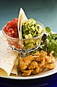 Tortillas with chicken, avocado and tomato