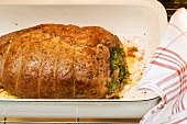 Roast pork in a roasting dish