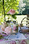 Romantic table in castle garden (La Verrerie, France)
