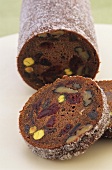 Fruit and nut bread, partly sliced