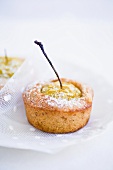 Plum mini-muffin with icing sugar