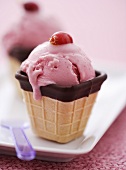 Cranberry ice cream in wafer cup