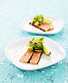 Salmon fillet with salad leaves and lime