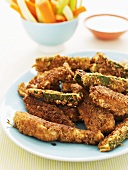 Breaded chicken and courgette strips with dip